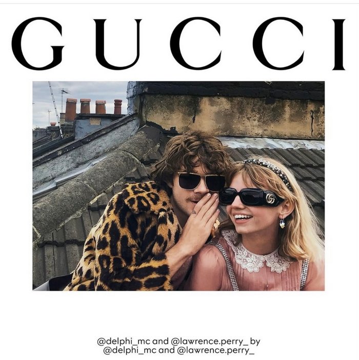 Para w okularach Gucci